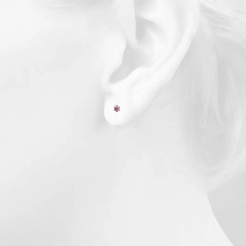 Delicate Pink Sapphire Stud Earrings Encased in 18k Gold